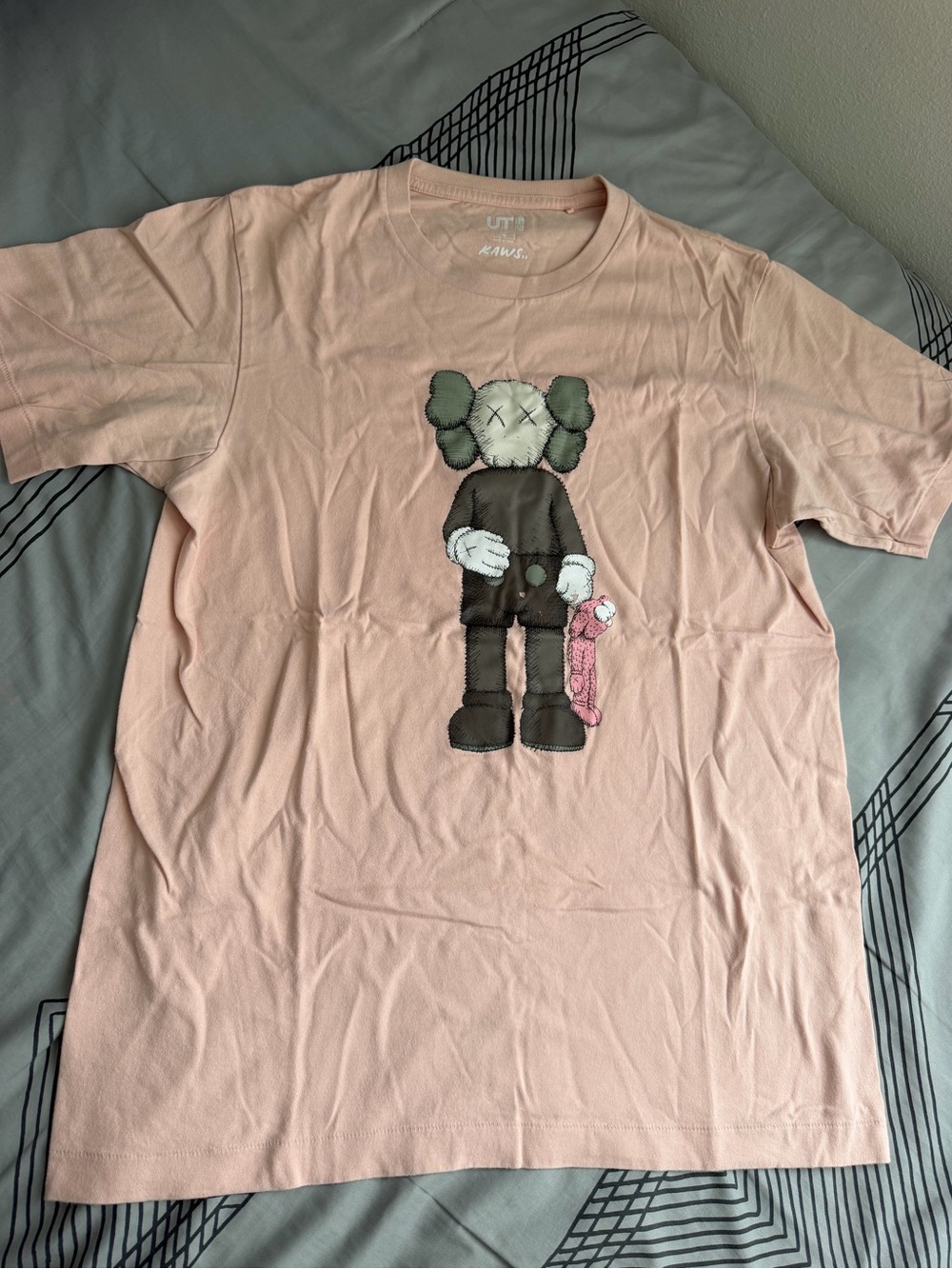 KAWS Uniqlo Pink Graphic Tee